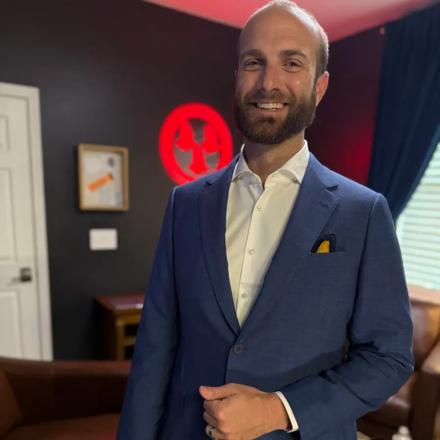 A client in a custom blue-gray sport coat