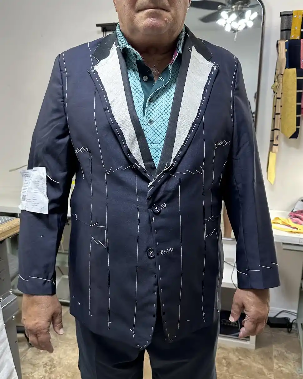 Reading posture and balance on a first-fit garment at Florida Suit Guy showroom