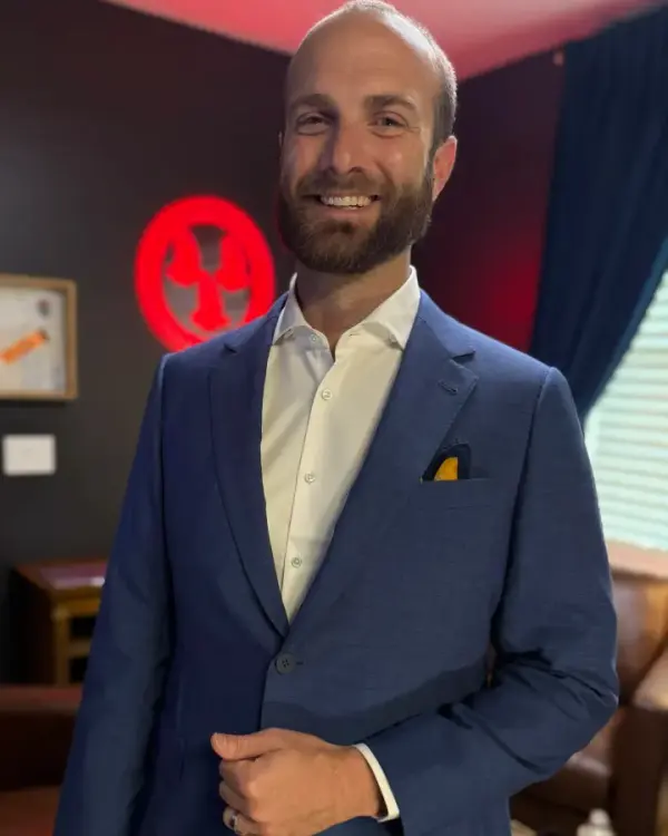 A client in a custom blue-gray sport coat