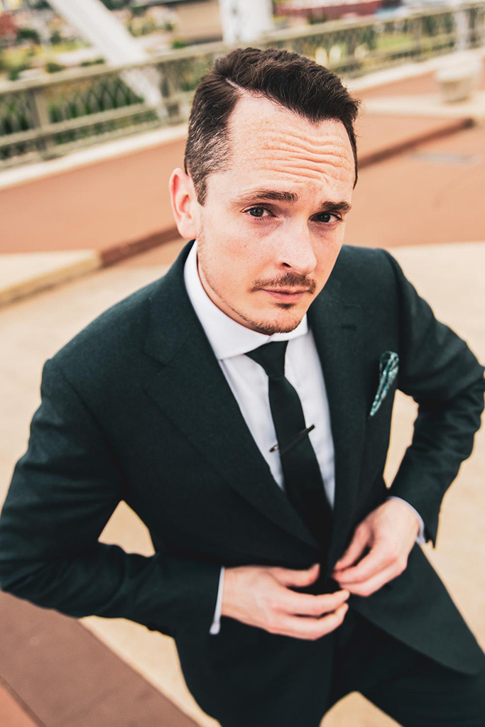 man in a blue custom suit